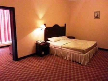 Doha Grand Hotel Szoba fotó