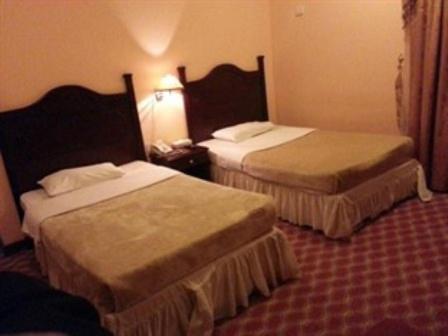 Doha Grand Hotel Szoba fotó