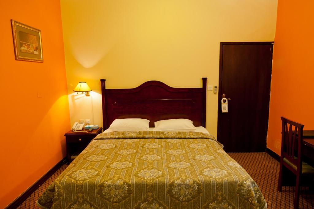 Doha Grand Hotel Szoba fotó